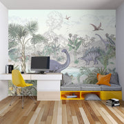 Jungle dinosaur wall mural and wallpaper featuring Stegosaurus, Brontosaurus, lush jungle plants and volcanoes; styled in  kid's room.