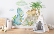 Cute dinosaur wall mural with watercolor-style dinosaurs, tropical plants, and soft pastel clouds, perfect for nurseries, kid's bedrooms, and playrooms.