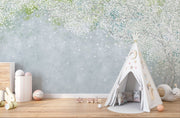 Soft blue and green wall mural with delicate white blossoms, creating a peaceful and elegant ambiance.