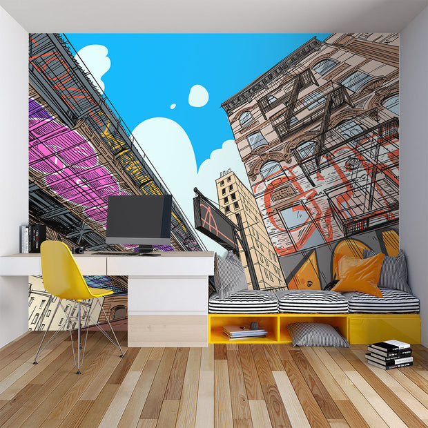 Urban cityscape wall mural with graffiti, comic-style illustration of skyscrapers and underpass, modern street art wallpaper for bedroom or living room decor.
