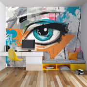 Abstract eye graffiti wall mural with bold blue eye, orange and teal splashes, and street art-inspired brushstrokes.