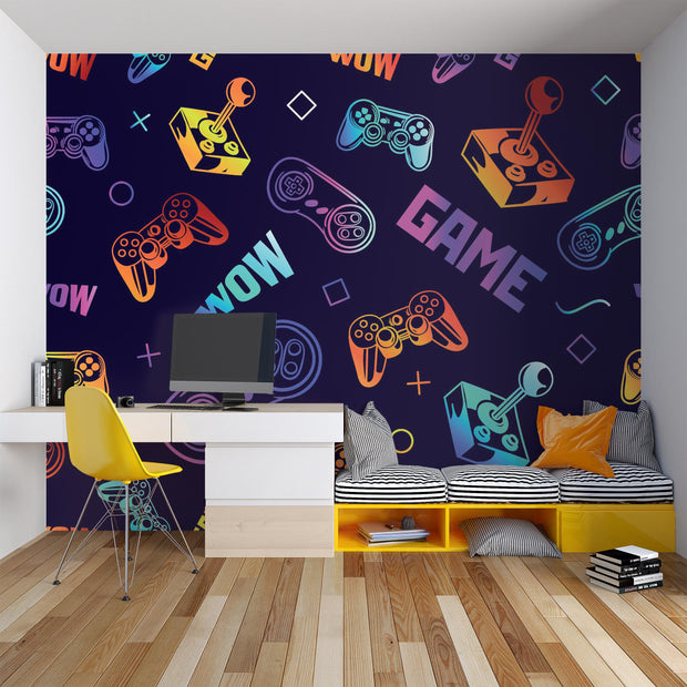 Room interior with colorful game-themed wallpaper, desk, and chairs.