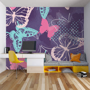 Butterfly wall mural featuring teal, pink, and purple butterfly designs on a textured dark purple background, perfect for adding elegance to bedrooms or creative spaces.