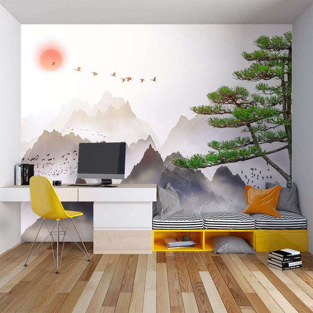 Minimalist Japanese mountain landscape wall mural with coral sunset and flying birds, styled in modern study.