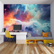 Celestial Dreams galaxy wall mural with colorful nebula clouds in orange, blue, and purple tones, styled in a study.