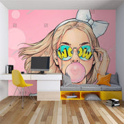 Trendy pop art wall mural featuring a stylish girl with sunglasses and bubble gum on a pink background.