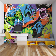 Graffiti-style gaming wall mural featuring bold graphics, colorful game controllers, energetic text like "Level Win" and "Fun," perfect for a modern game room.