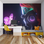 Modern room with a colorful wall mural, desk, and colorful chair.