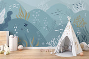 Underwater-themed ocean wall mural featuring fish, seaweed, bubbles, and rolling waves in soft blues and greens. Ideal for kids’ rooms and ocean-inspired interiors.