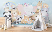 Watercolor baby animal wall mural with an elephant, lion, panda, fox, koala, and other cute creatures in pastel tones.