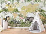 Children's world map wall mural with illustrated safari animals and tropical plants, styled in modern nursery setting.