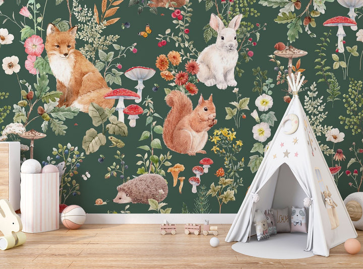 Enchanted forest animals wall mural with foxes, rabbits, hedgehogs, wildflowers, and mushrooms in a vintage botanical style, set against a deep green background.