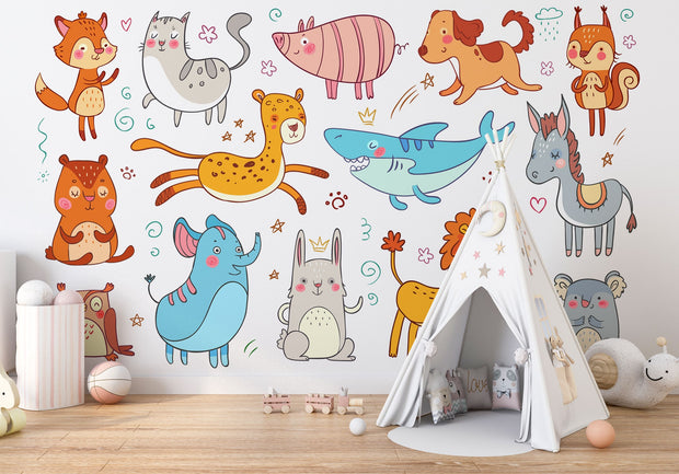 Colorful cartoon animal wall mural in a children's playroom featuring a fox, lion, bunny, shark, elephant, and more