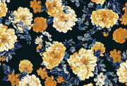 Midnight bloom wall mural featuring large yellow and cream flowers with deep blue foliage on a dark background, creating a dramatic and elegant room atmosphere.