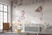A whimsical nursery wall mural featuring a pink unicorn resting on clouds, a girl swinging with floral details, and soft pastel tones for a dreamy ambiance.