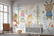Winter woodland animal wall mural featuring a bear, fox, deer, and owl in cozy knitted sweaters, surrounded by snow-covered trees and soft blue foliage.