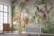 Tropical safari wall mural with exotic animals, including an elephant, giraffe, lion, toucan, and parrot, surrounded by lush tropical leaves and greenery – perfect for kid's rooms and nature-inspired interiors.