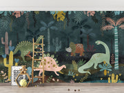 Dark jungle dinosaur wall mural featuring whimsical dinosaurs, exotic plants, and a deep green forest setting, perfect for nurseries and kids’ rooms.