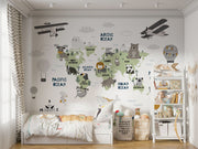 Scandinavian style children's world map wall mural with cute animals and airplanes, styled in a kid's bedroom.