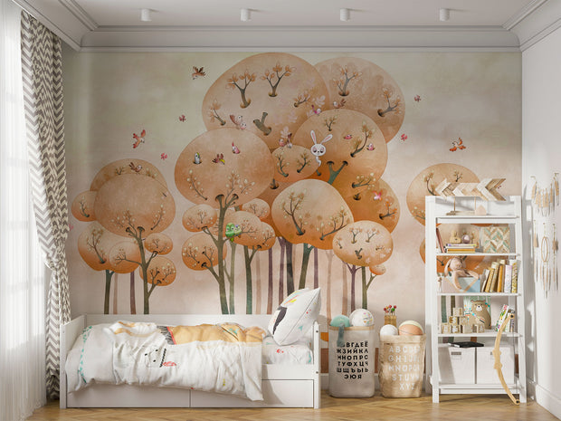 Woodland adventure wall mural with illustrated trees, animals and playful nature elements in a cozy children's room setting.