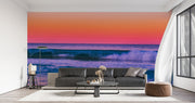 Tropical Ocean Sunset Wall Mural – Vibrant Seascape Wallpaper Featuring Rolling Waves, a Pink-Orange Twilight Sky, and a Relaxing Coastal Ambiance for Modern Interiors.