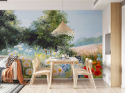Hand-painted wall mural featuring a summer meadow with wildflowers, daisies, tall grass, and a soft blue sky, creating a peaceful countryside scene.