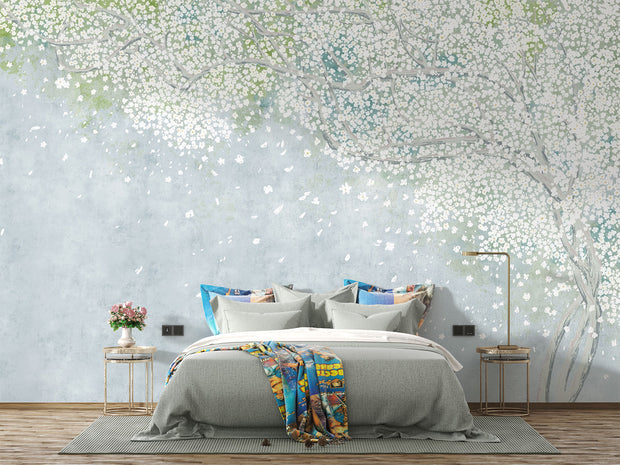 Soft blue and green wall mural with delicate white blossoms, creating a peaceful and elegant ambiance.