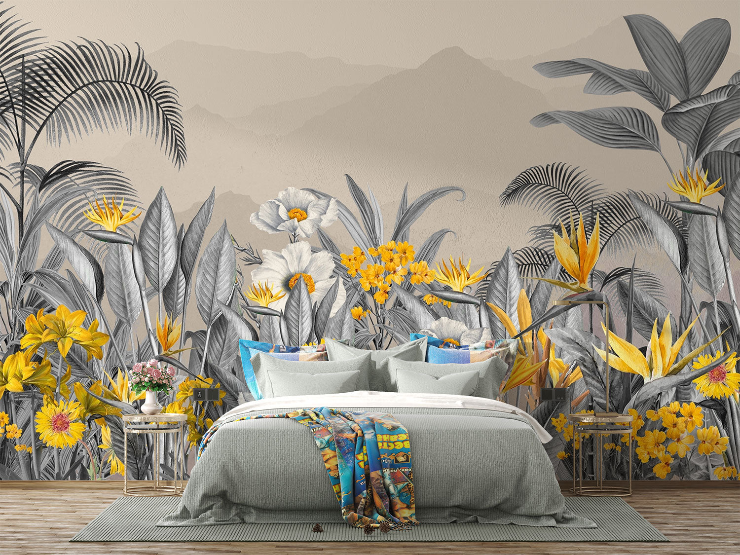 Modern tropical botanical wall mural with grayscale jungle leaves, vibrant yellow flowers, and a misty mountain backdrop in a cozy bedroom setting.
