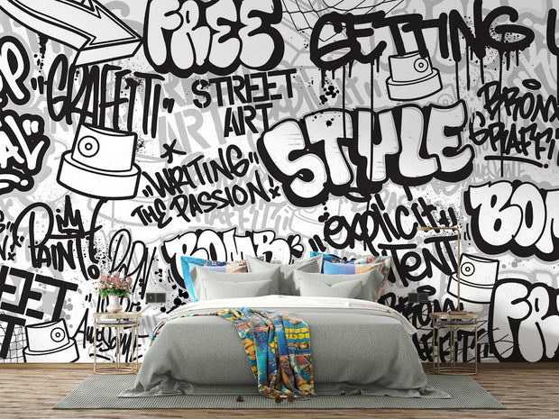 Graffiti wall mural with black-and-white street art typography and spray paint elements, ideal for urban-inspired bedrooms or creative spaces.