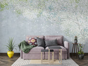 Soft blue and green wall mural with delicate white blossoms, creating a peaceful and elegant ambiance.