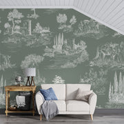 Timeless Toile Wall Mural featuring intricate pastoral illustrations on a muted green background, creating a vintage and elegant ambiance.