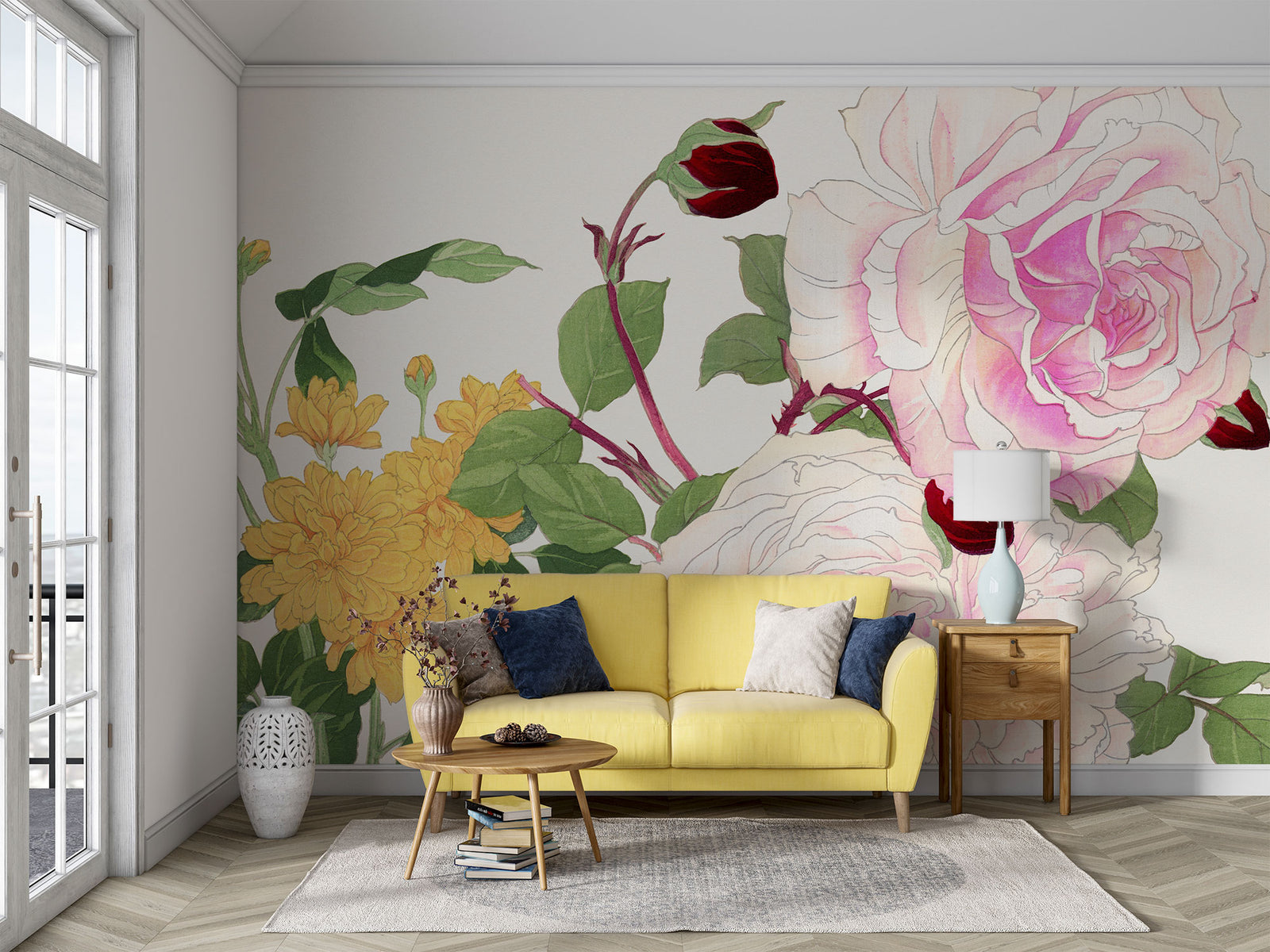 Wall mural with vintage-style pink and white roses, yellow chrysanthemums, and green foliage behind a yellow sofa and wooden side table.