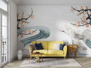 Crane Symphony Wall Mural – Elegant gold-accented cranes flying over ocean waves with cherry blossoms in a Japanese-inspired design.