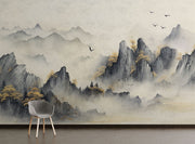 Minimalist living room featuring a Tranquil Peaks Wall Mural with misty watercolor mountains and golden foliage. 