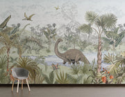 Prehistoric dinosaur wall mural featuring a jungle scene with a Brachiosaurus, Stegosaurus, pterodactyls, and a volcano in a children’s room.