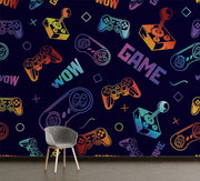 Colorful gaming controller and 'WOW' pattern on a dark blue wall with a chair in front.