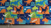 Colorful dinosaur themed wall mural featuring vibrant dinosaur silhouettes, footprints and phrases like "ROAR" and "DANGER,".