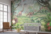 Jurassic Dinosaur Wall Mural – Realistic Prehistoric Scene with Brachiosaurus, Triceratops, and Velociraptors in a Lush Green Landscape for Kids' Rooms.