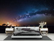 Milky Way Night Sky Wall Mural – Stunning Galaxy Wallpaper Featuring a Starry Sky, Deep Cosmic Blues, and Twilight Horizon for Celestial-Inspired Interiors.