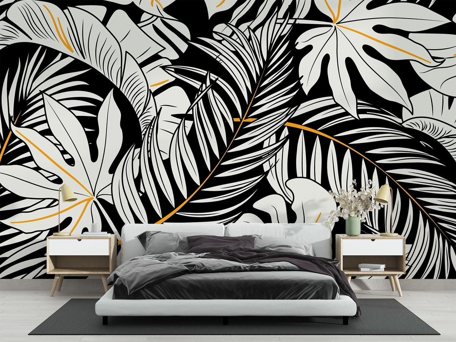 Black and white tropical leaf wall mural with gold accents, featuring monstera and palm leaves in a modern botanical design.