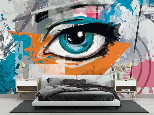 Abstract eye graffiti wall mural with bold blue eye, orange and teal splashes, and street art-inspired brushstrokes.