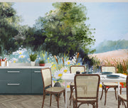 Hand-painted wall mural featuring a summer meadow with wildflowers, daisies, tall grass, and a soft blue sky, creating a peaceful countryside scene.