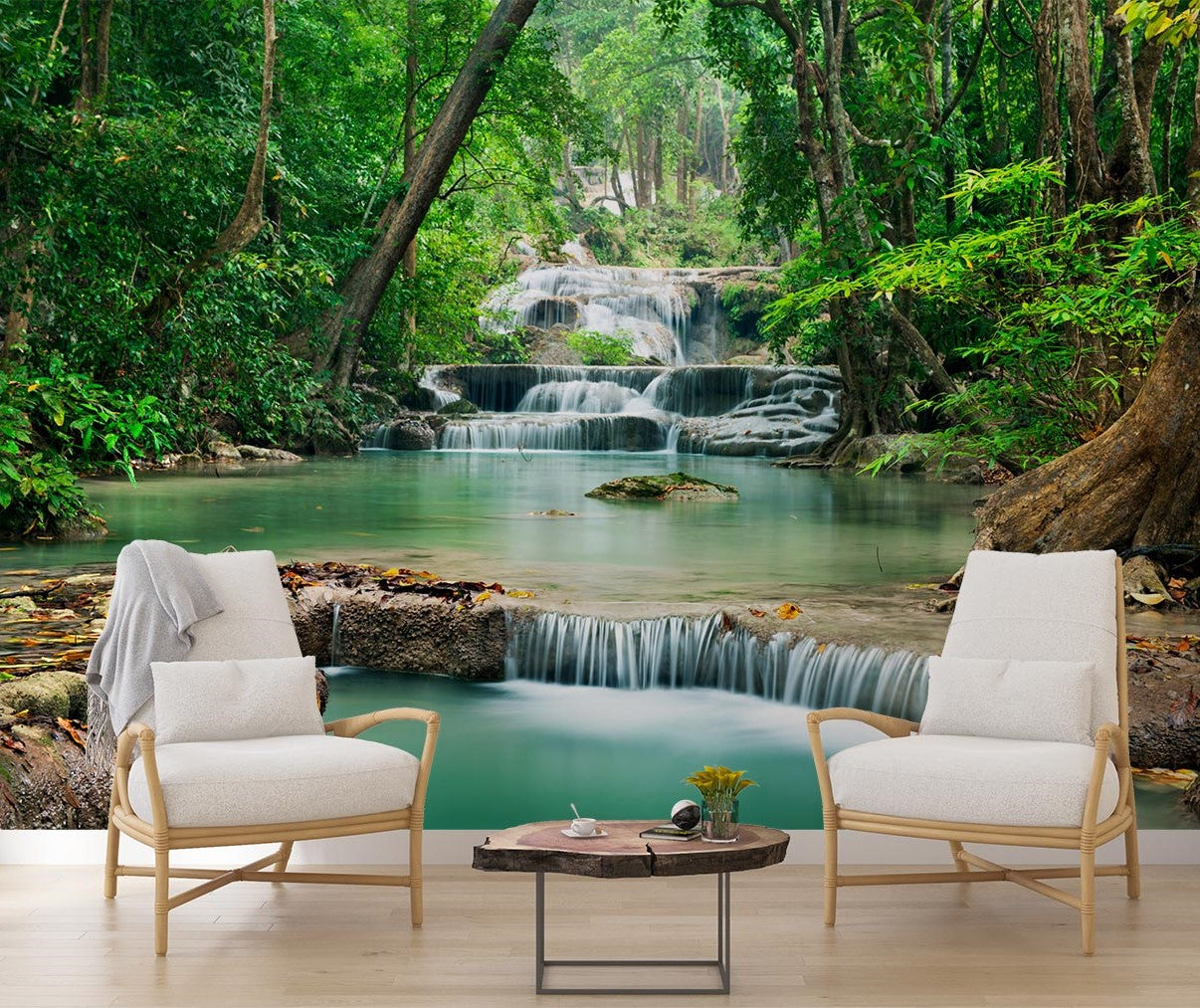 Wall mural of a lush green forest with cascading waterfalls, creating a peaceful ambiance in a modern room.
