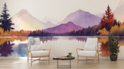Watercolor mountain lake wall mural with warm autumn hues, reflecting trees, and serene nature-inspired scenery.