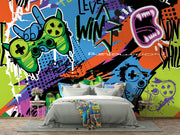Graffiti-style gaming wall mural featuring bold graphics, colorful game controllers, energetic text like "Level Win" and "Fun," perfect for a modern game room.