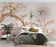Chinoiserie-style wall mural featuring blooming cherry blossoms, elegant birds in flight, and a soft watercolor-inspired background with a subtle sun.