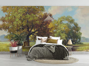 Hand-painted style wall mural featuring golden trees, a countryside meadow, and a walking path under a soft sky.