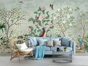 Hand-painted wall mural with exotic birds, lush green foliage, and delicate floral details, creating a tropical-inspired and sophisticated interior décor.
