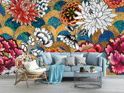Gold floral Chinoiserie mural in bright living room with light blue couch and botanical décor.