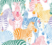 Multicolor zebra wall mural featuring vibrant pink, blue, orange, and yellow zebras on a white background, ideal for modern decor.